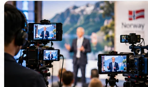 Professional video cameras recording a business media event in Norway